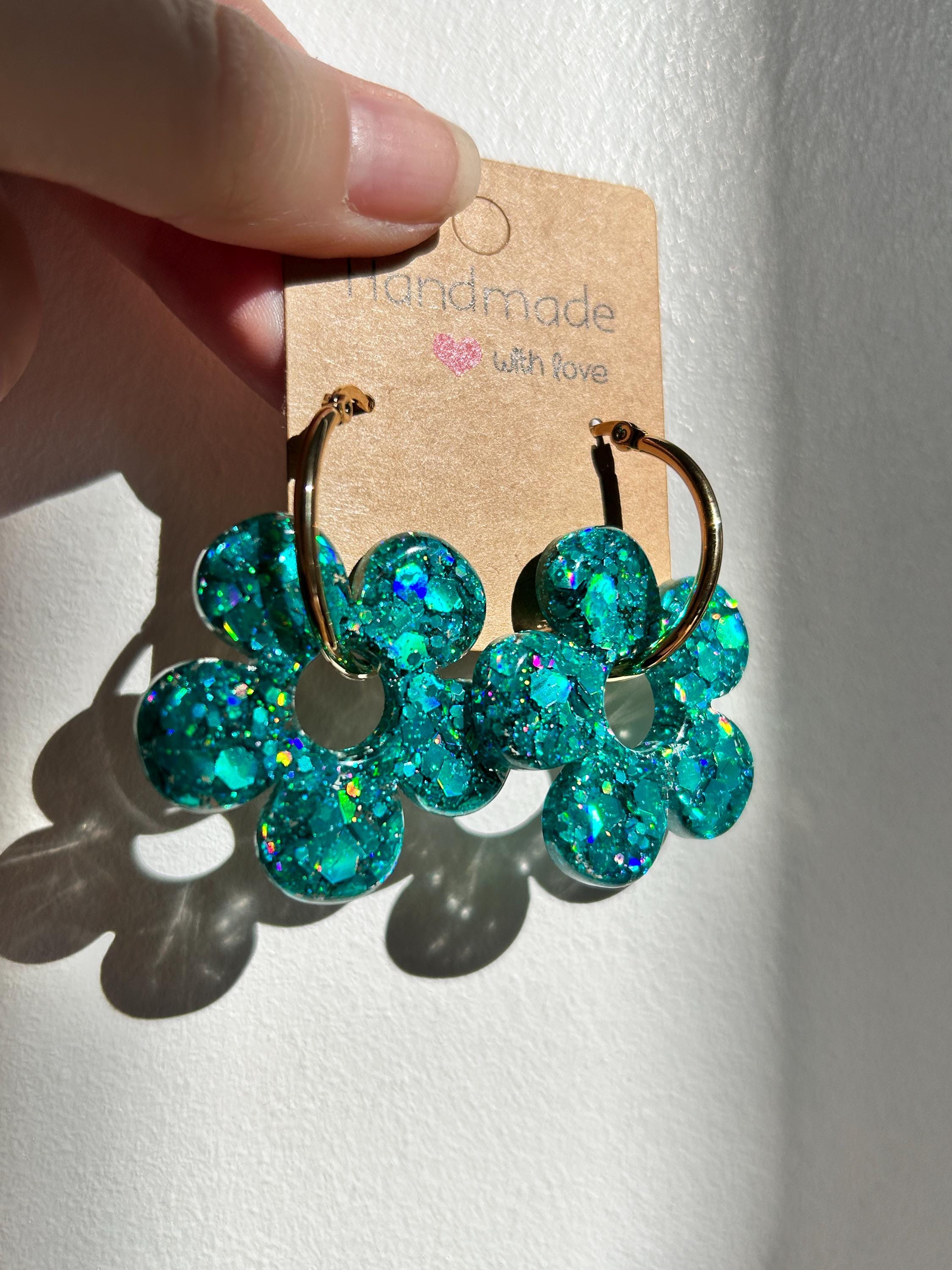 Boucles d'oreilles créoles doré en acier inoxydable avec pampilles fleurs