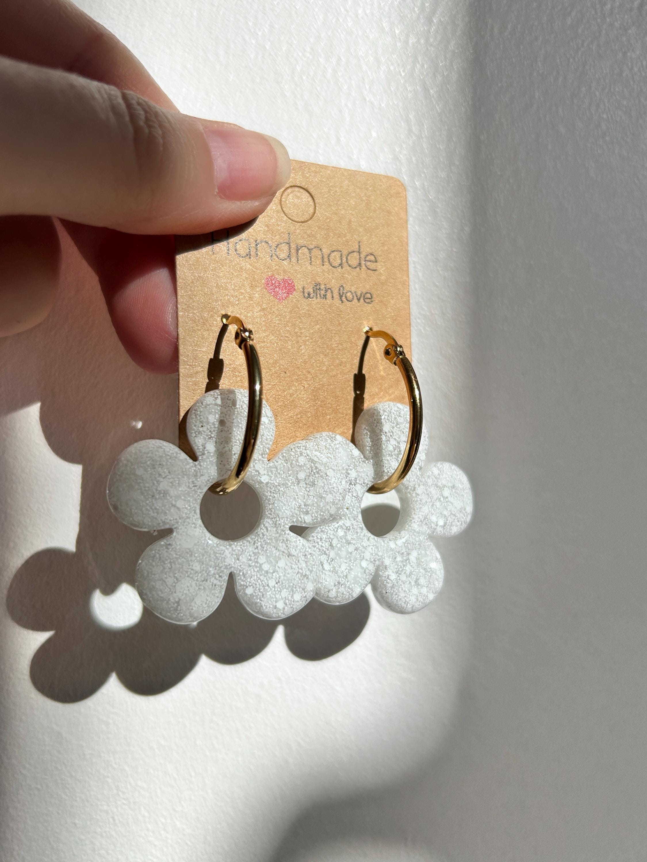 Boucles d'oreilles créoles doré en acier inoxydable avec pampilles fleurs