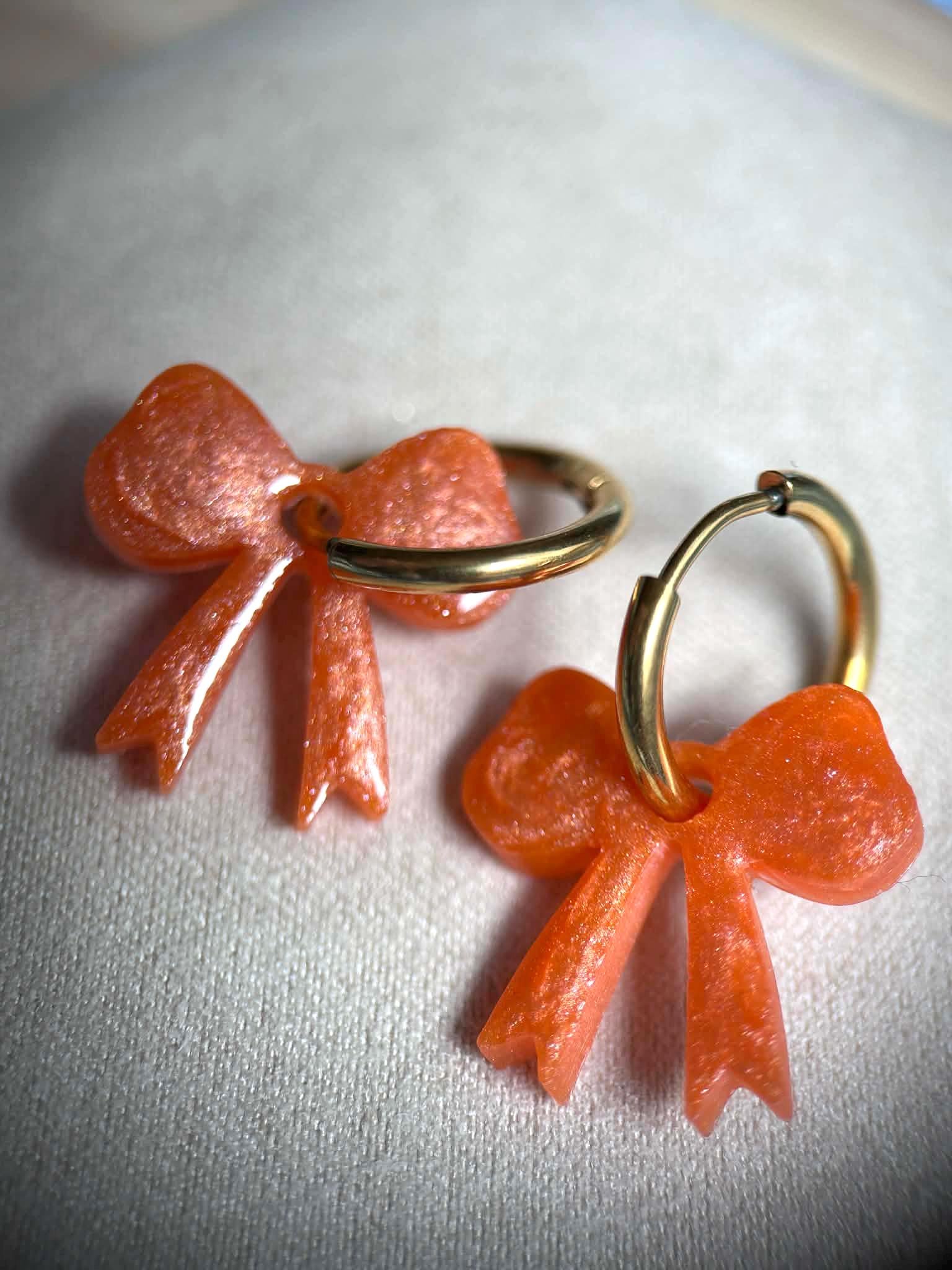 Boucles d'oreilles créoles et pampilles nœud