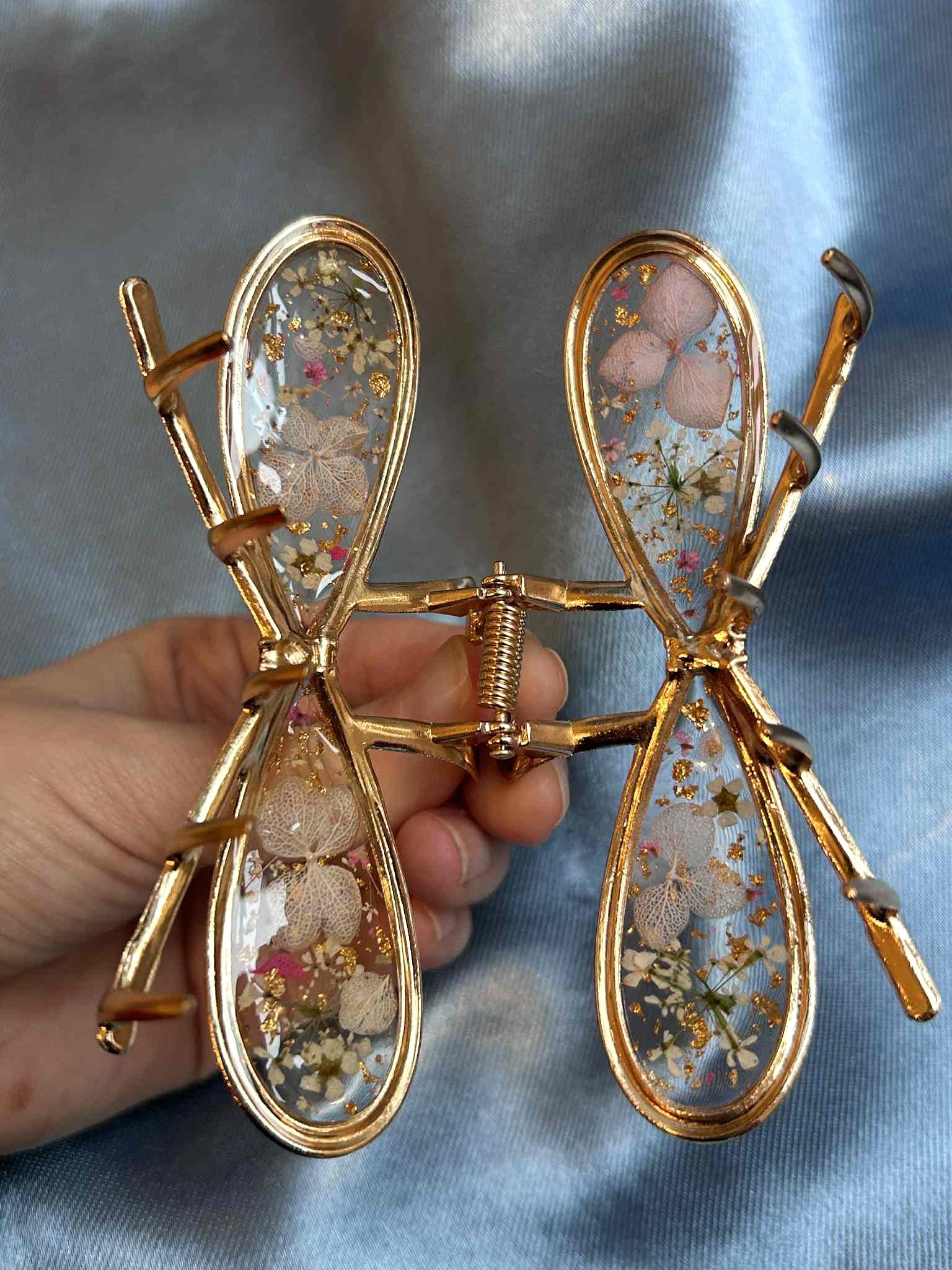Pince à cheveux en forme de nœud avec fleurs séchées